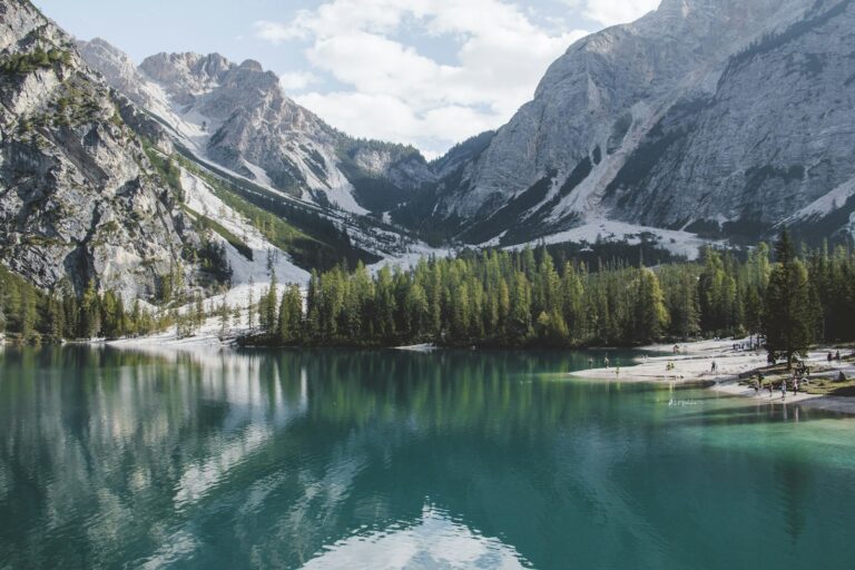 A lake beneath the peaks of the Dolomites